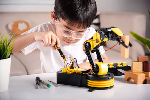 kid-making-yellow-black-robocar